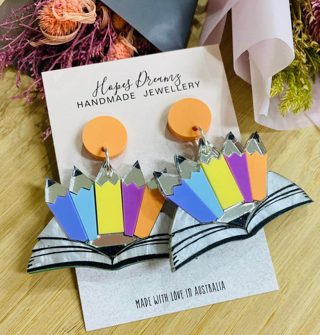 Book and crayon earrings