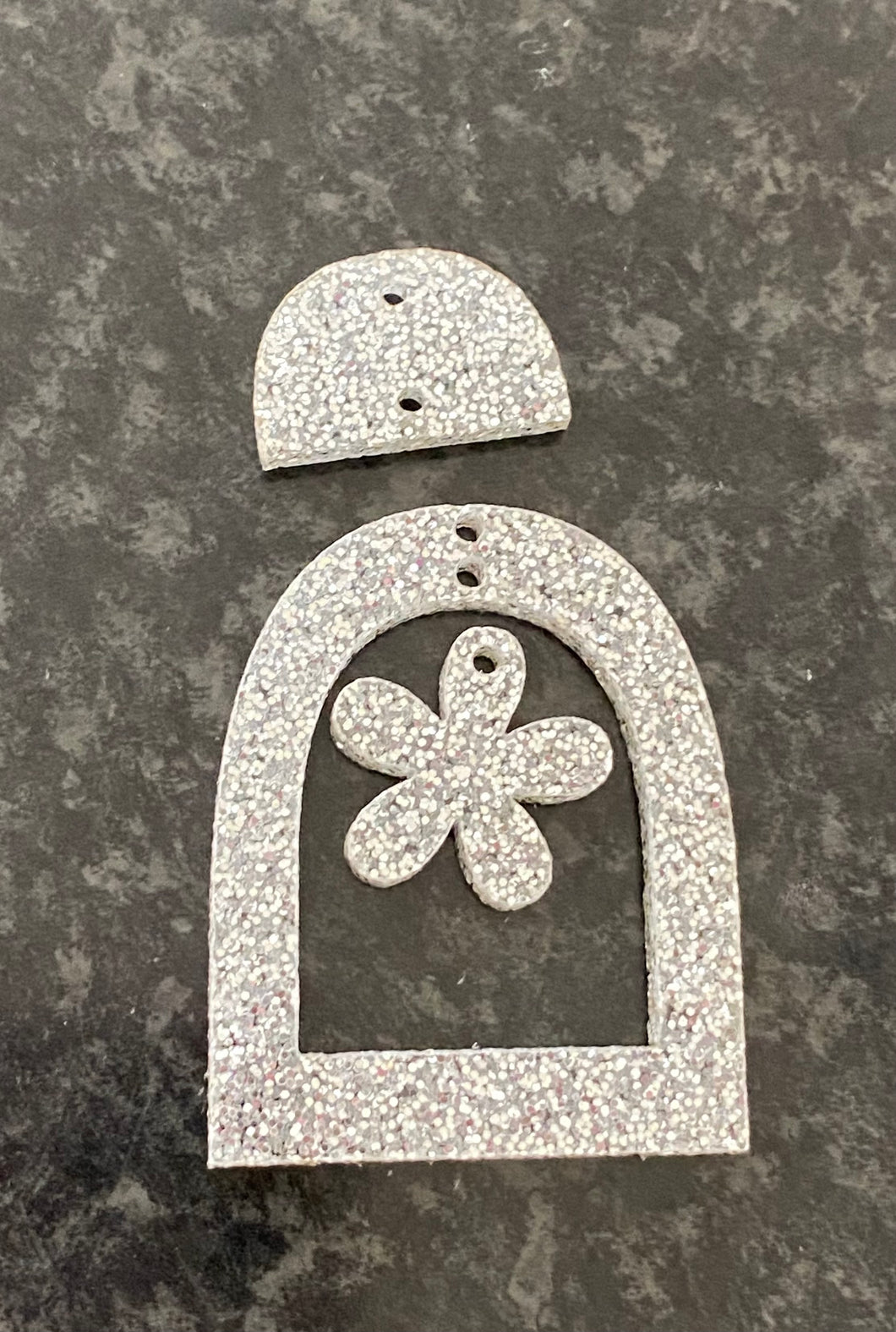 Silver glitter flower arch