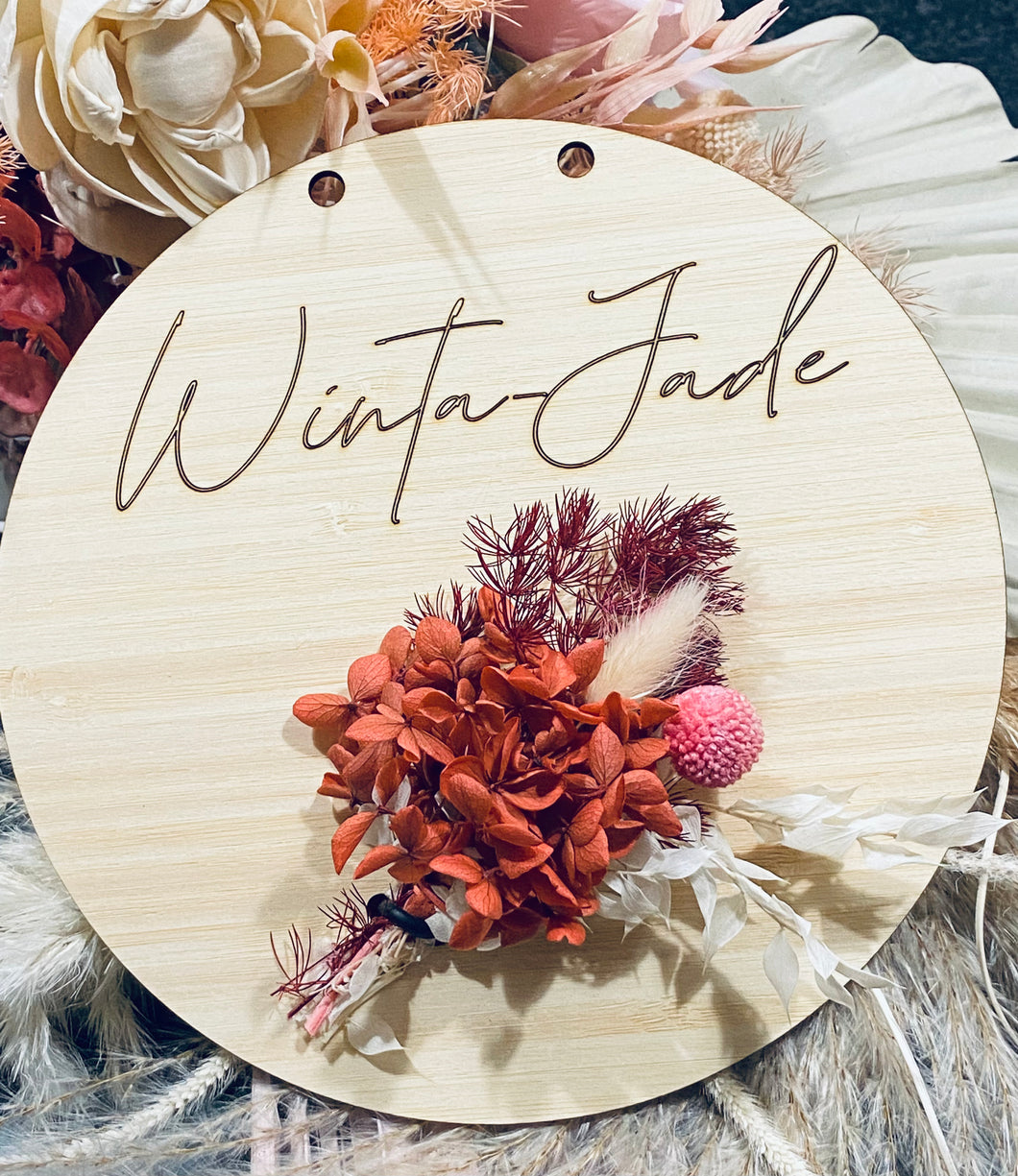 Name plaque with bunch dried flowers