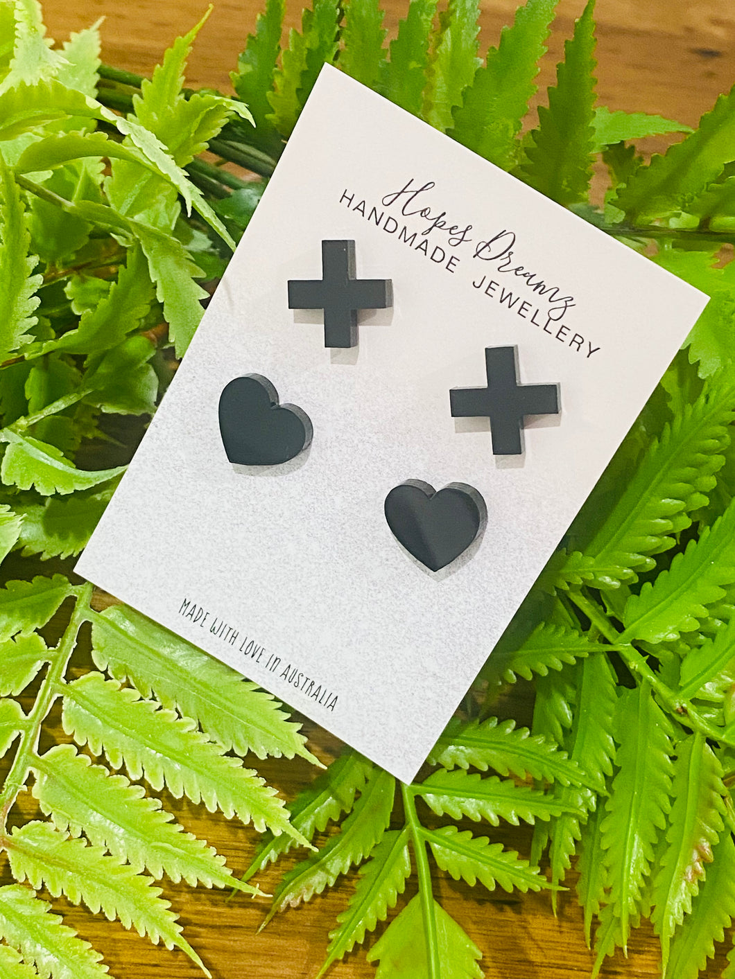 Cross heart studs