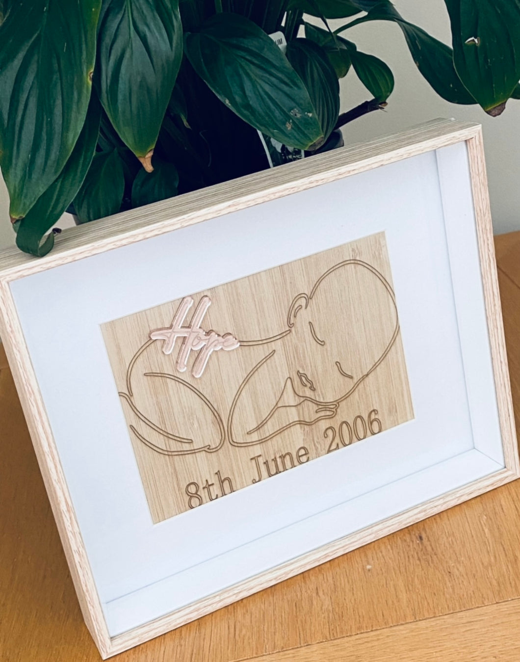 Framed baby birth detail